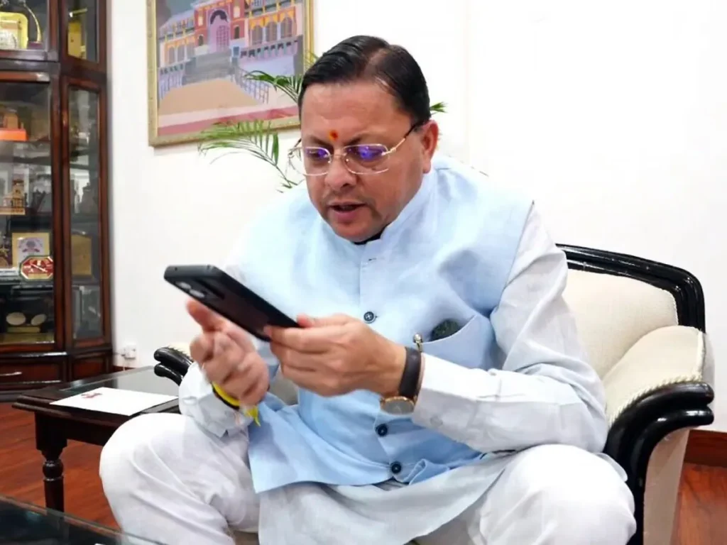 PUSHKAR_SINGH_DHAMI_ON_PHONE_1777127175862_1777127179194