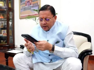 PUSHKAR_SINGH_DHAMI_ON_PHONE_1777127175862_1777127179194